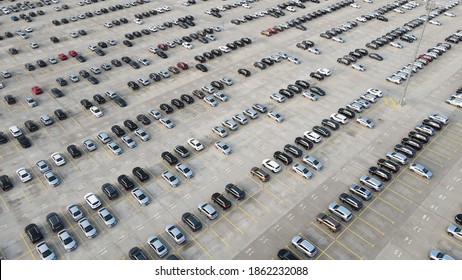 Aerial View Of New Cars Lined Up Parking Outside Factory On Car Factory Background.