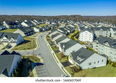 Aerial View Of New Middle Class Residential Community Multi-family Development Project With Apartments, Condos, Duplexes, Town Homes And Single Family Homes Neighborhood West Waverly Maryland USA