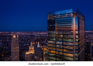 Aerial View Of New York City Manhattan Skyline With Three World Trade Center At Dusk.