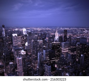 Aerial view of the New York City Skyline at sunset with a blue hue