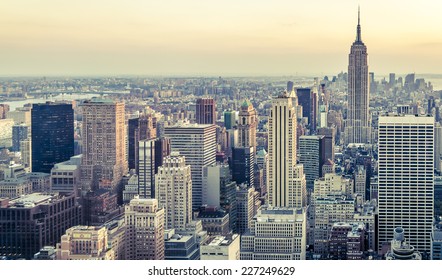 Aerial view of New York city in the USA showcasing the architecture of its historic and modern buildings with a hint of cross processed colors at sunset. - Shutterstock ID 227249629