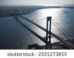 Aerial view of New York City-s Verrazano-Narrow-s bridge with ship.