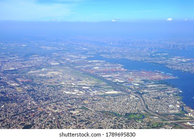 Aerial view of Newark Liberty International Airport (EWR) with the New York City skyline in the background