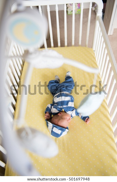 baby boy in crib
