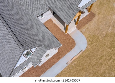 Aerial View Of Newly Installed Roof With Asphalt Shingles With Bitumen Tiles On New Home The Rooftop