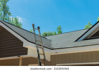 Aerial View Of Newly Installed Roof With Asphalt Shingles With Bitumen Tiles On New Home The Rooftop