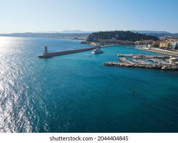 Aerial view of Nice sea and port, in Nizza region, France Nice's Roofs and Promenade des Anglais. Drone view of Provence-Alpes-Côte d'Azur. Nice is a city located on the French Riviera.