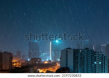 aerial view night city rain. High Angle Cityscape During A night rain Storm