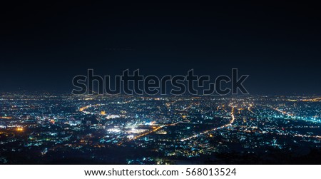 Photo of aerial view, night city view with night sky.  natural winter night view in Thailand