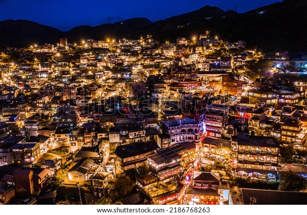 aerial view\
of night scene of Jioufen village, Taiwan. The colourful scene at\
night of Jiufen old city, Jiufen,\
Taiwan.