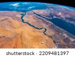 Aerial view of Nile River, Red Sea and Mediterranean Sea. Egypt, Saudi Arabia, Israel and Jordan as seen from space. Satellite view. Elements of this image furnished by NASA.