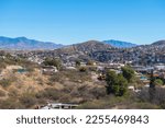 Aerial view of Nogales Sonora with Border Wall between Nogales Arizona USA and Nogales Sonora Mexico near International Street in city of Nogales, Arizona AZ, USA. 