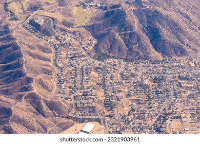 Aerial view of the Norco Ridge in Norco, California featuring Pumpkin Rock, The Hidden Valley Golf Club and the Norco Ridge Ranch, - Powered by Shutterstock