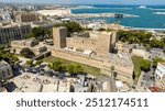 Aerial view of the Norman-Swabian castle in the historic center of Bari, Puglia, Italy. The imposing fortress, symbol of the city of Bari, is located on the edge of the old town near the port.