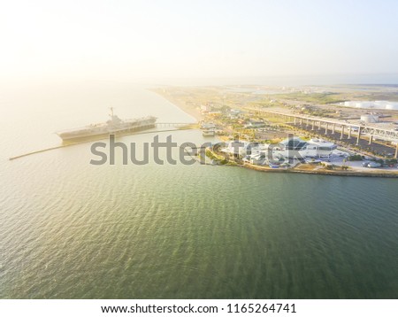 Aerial view North Beach in Corpus Christi, Texas, USA with aircraft carrier ship