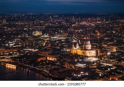 Aerial View Of North East Part Of London, In Evening. St Pauls Cathedral Visible Over River Thames