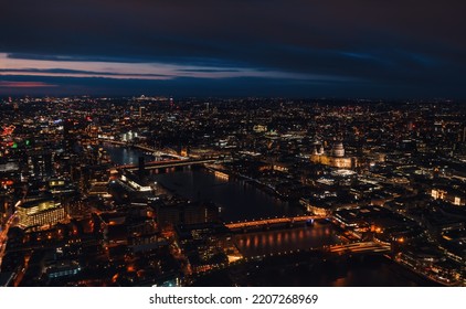 Aerial View Of North East Part Of London, In Evening. St Pauls Cathedral Visible Over River Thames