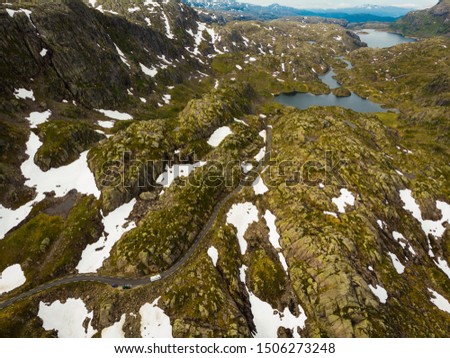 Aerial view. Norway landscape. Road and lakes in stony rocks mountains. Norwegian national tourist scenic route Ryfylke.