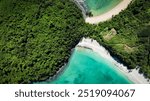 Aerial view of Nosy Iranja Island showcasing its lush greenery and stunning turquoise waters in Madagascar