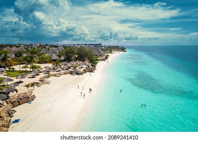 Aerial View Of Nungwi Beach In Zanzibar, Tanzania With Luxury Resort And Turquoise Ocean Water. Toned Image.