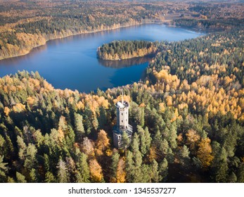 Aerial view of the observation tower in autumn landscape at Aulanko nature reserve park in Hameenlinna, Finland. Fall colors make trees look beautiful colorful