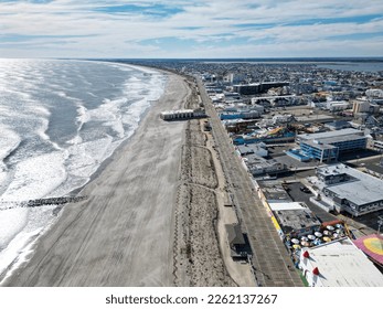Aerial view of the Ocean City, New Jersey boardwalk and beach with the Music Pier seen - Powered by Shutterstock