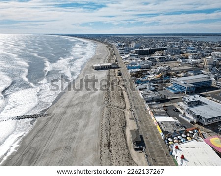 Aerial view of the Ocean City, New Jersey boardwalk and beach with the Music Pier seen