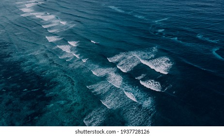 Aerial view to ocean waves. With a blue water