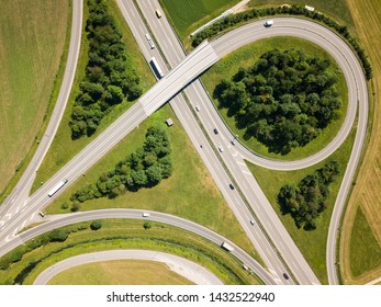 Aerial View Oensingen Switzerland Highway Intersection Traffic and Urban Sprawl close to Jura Mountains