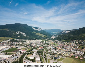 Aerial View Oensingen Switzerland Highway Intersection Traffic And Urban Sprawl Close To Jura Mountains