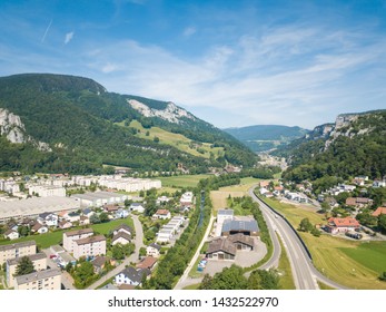 Aerial View Oensingen Switzerland Highway Intersection Traffic And Urban Sprawl Close To Jura Mountains