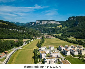 Aerial View Oensingen Switzerland Highway Intersection Traffic And Urban Sprawl Close To Jura Mountains