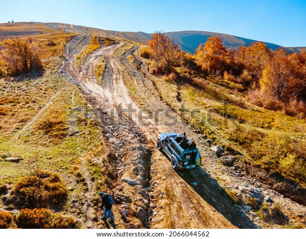 aerial view of off road\
attraction road to the top of carpathian mountains copy space\
autumn season
