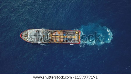 Aerial view of a offshore vessel or barge. The vessel is to support and assist subsea development activity offshore.