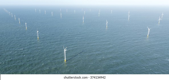 Aerial View Of Offshore Wind Turbine Farm In The Noordzee At Egmond Aan Zee, The Netherlands. The Project Is From Shell And Nuon.