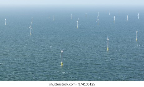 Aerial View Of Offshore Wind Turbine Farm In The Noordzee At Egmond Aan Zee, The Netherlands. The Project Is From Shell And Nuon.