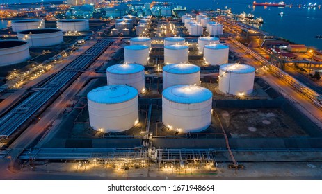 Aerial view oil and gas terminal storage tank farm,Tank farm storage chemical petroleum petrochemical refinery product, Business commercial trade fuel and energy transport by tanker vessel.
