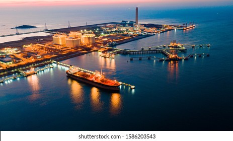 Aerial View Oil Tanker. Oil Loading Dock Of Business Logistic Sea Going Ship, Crude Oil Tanker Lpg Ngv At Night / Group Oil Tanker Ship To Port Of Singapore - Cargo Ship Import Export