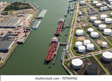 Aerial view of oil tankers moored at a oil storage terminal.