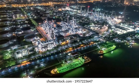 aerial view oil tankers park at oil port at night.