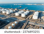 Aerial view or oil terminal is industrial facility for storage tank of oil and lpg Petrochemical. oil manufacturing products ready for transport and business transportation, lpg tank, cng tank