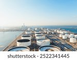 Aerial view or oil terminal is industrial facility for storage tank of oil and LPG Petrochemical. oil manufacturing products ready for transport and business transportation, LPG Tank, CNG tank