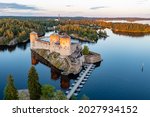 Aerial view of Olavinlinna medieval castle in Savonlinna, Finland. Drone photography
