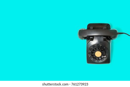 Aerial View Of Old And Antique Rotary Telephone On Turquoise Background