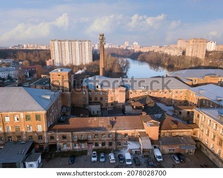 Aerial view of the old cotton factory on the sunny autumn day. City of Balashikha, Moscow region, Russia.