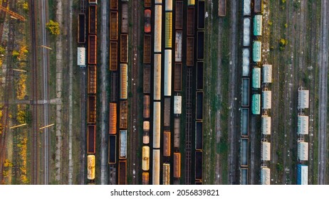 Aerial View. Old Defective And Looted Railway Wagons Stand On The Territory Of The Repair Depot Awaiting Repairs. Poor Business Management. Ukrainian Railway, DVRZ.