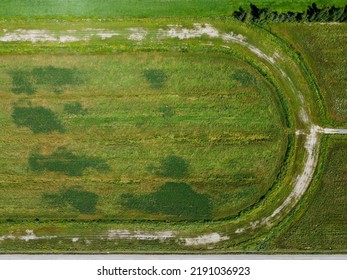 Aerial View Of An Old Horse Racing Track, With Green Grass