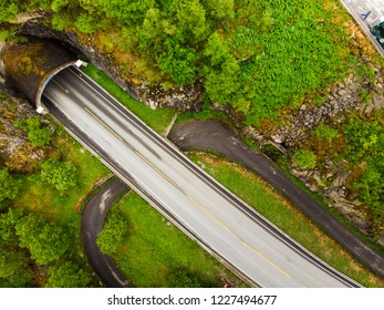 Aerial View. Old And New Road With Tunnel In Green Summer Mountains, Mabodalen Valley Norway. National Tourist Hardangervidda Route.