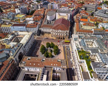 Aerial View Of The Old Square With A Monument To The Artist And Inventor Leonardo Da Vinci Next To The La Scala Opera House, The Comuna And The Vittorio Emmanuele Gallery In Milan Italy 09.2022