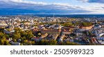 Aerial view of Olomouc cityscape overlooking Gothic spire of Saint Wenceslas Cathedral on sunny autumn day, Moravia, Czech Republic